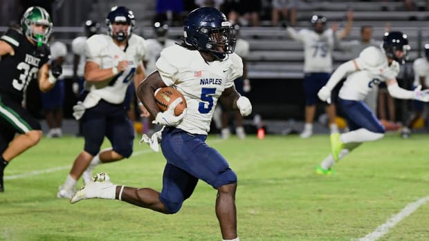 Naples Golden Eagles running back Shawn Simeon (#5) is hard to stop.