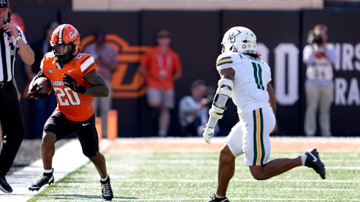 Baylor's Keaton Thomas (11) defends in the first half of the college football game between the Oklahoma State Cowboys and the Baylor Bears at Boone Pickens Stadium in Stillwater, Oklahoma