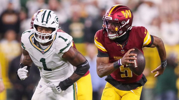 Jayden Daniels (right) was hurt against the Packers and could miss Week 3, which caused a shift in the Commanders-Raiders odds. 