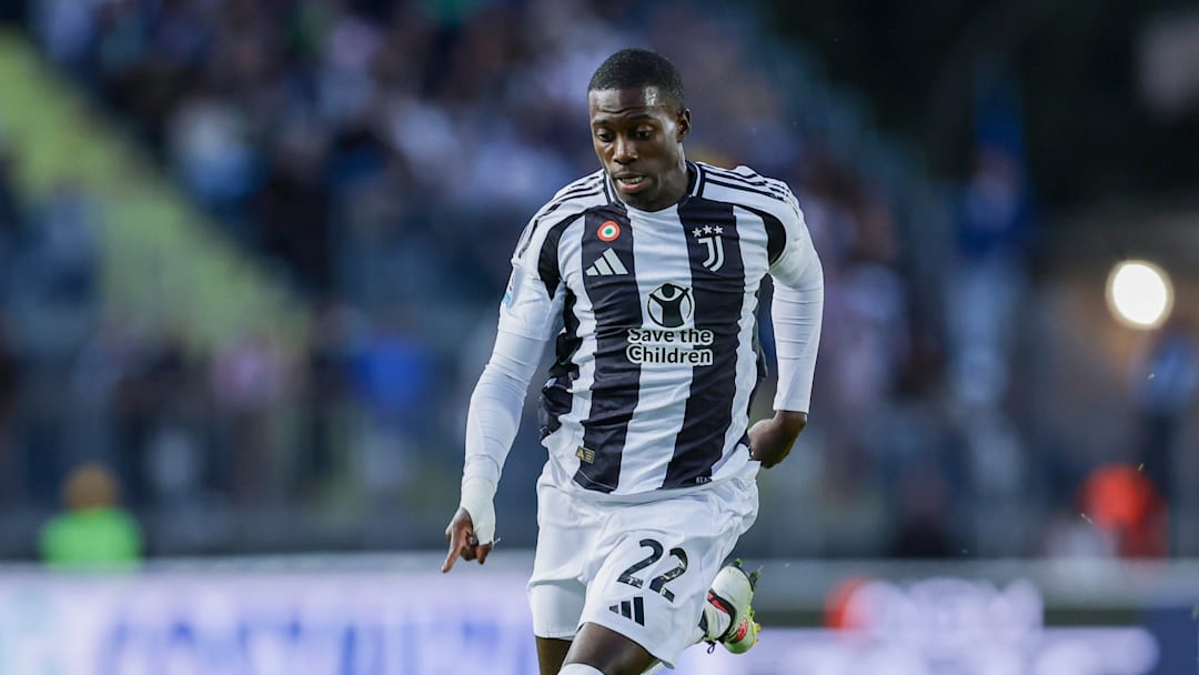 Juventus' American forward Timothy Weah controls the ball...