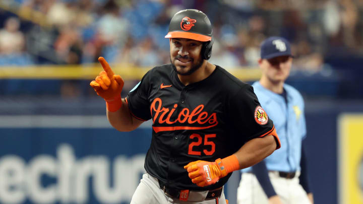 Aug 11, 2024; St. Petersburg, Florida, USA;  Baltimore Orioles outfielder Anthony Santander (25) smiles as he rund around the bases after he hit a home run during the fourth inning against the Tampa Bay Rays at Tropicana Field. Mandatory Credit: Kim Klement Neitzel-USA TODAY Sports