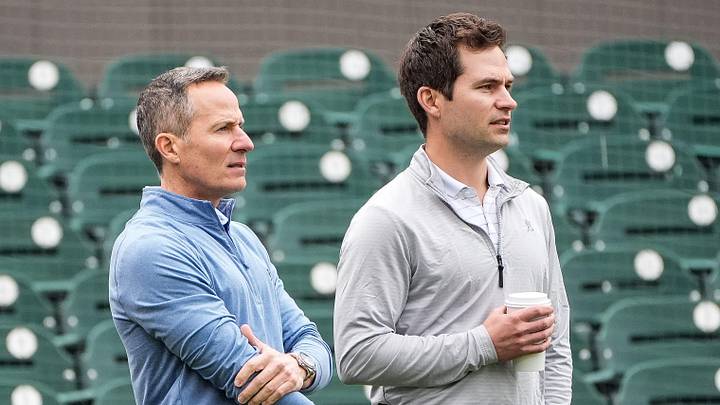 Detroit Tigers team owner Chris Ilitch, left, talks to president of baseball operation Scott Harris as they watch batting practice during spring training at Joker Marchant Stadium in Lakeland, Fla. on Thursday, Feb. 20, 2025.