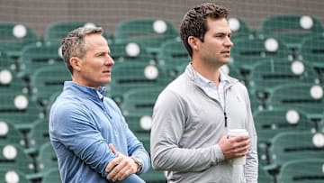 Detroit Tigers team owner Chris Ilitch, left, talks to president of baseball operation Scott Harris as they watch batting practice during spring training at Joker Marchant Stadium in Lakeland, Fla. on Thursday, Feb. 20, 2025.