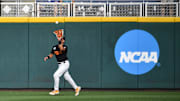 Tennessee's Hunter Ensley (9) makes a catch in the outfield during game three of the NCAA College World Series finals between Tennessee and Texas A&M at Charles Schwab Field in Omaha, Neb., on Monday, June 24, 2024. Baseball is a sport that will be heavily affected by roster limits.