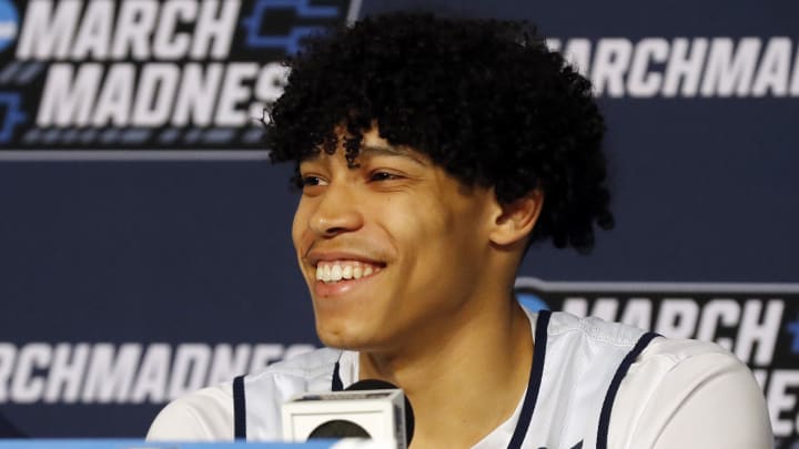 Mar 20, 2024; Pittsburgh, PA, USA;  Akron Zips forward Enrique Freeman (25) speaks at a pre-practice press conference before their 2024 NCAA Tournament First Round game at PPG Paints Arena. Mandatory Credit: Charles LeClaire-USA TODAY Sports
