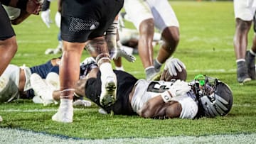 Oregon running back Dierre Hill Jr. falls into the end zone for a touchdown as the Oregon Ducks face the Penn State Nittany Lions on Sept. 27, 2025, at Beaver Stadium in University Park, Pennsylvania.