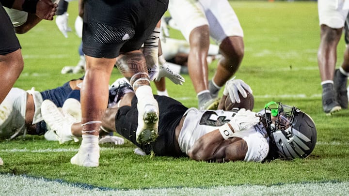 Oregon running back Dierre Hill Jr. falls into the end zone for a touchdown as the Oregon Ducks face the Penn State Nittany Lions on Sept. 27, 2025, at Beaver Stadium in University Park, Pennsylvania.
