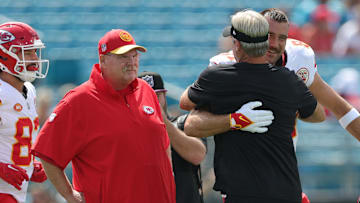 Sep 17, 2023; Jacksonville, Florida, USA;  Kansas City Chiefs head coach Andy Reid tight end Travis Kelce (87)and Jacksonville Jaguars head coach Doug Pederson talk before a game at EverBank Stadium. Mandatory Credit: Nathan Ray Seebeck-Imagn Images