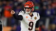 Nov 27, 2025; Baltimore, Maryland, USA; Cincinnati Bengals quarterback Joe Burrow (9) reacts against the Baltimore Ravens during the second half at M&T Bank Stadium. Mandatory Credit: Mitch Stringer-Imagn Images