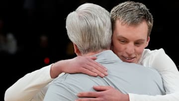 Iowa forward Payton Sandfort (20) hugs Iowa head coach Fran McCaffery during senior recognition ahead of a Big Ten Conference game against the Michigan State Spartans Thursday, March 6, 2025 at Carver-Hawkeye Arena in Iowa City.