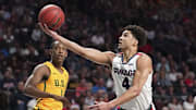March 9, 2020; Las Vegas, NV, USA; Gonzaga Bulldogs guard Ryan Woolridge (4) shoots the basketball against San Francisco Dons guard Jamaree Bouyea (1) during the first half during the semifinal game in the WCC Basketball Championships at Orleans Arena.