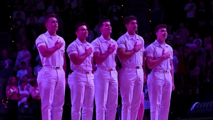 Feb 26, 2025; College Station, Texas, USA; Texas A&M Aggies yell leaders stand during the National Anthem prior to the game against the Vanderbilt Commodores at Reed Arena. Mandatory Credit: Maria Lysaker-Imagn Images 