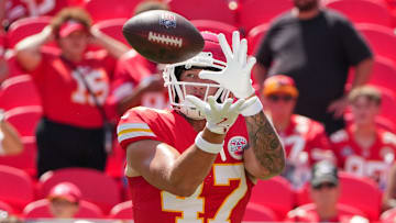 Aug 17, 2024; Kansas City, Missouri, USA; Kansas City Chiefs tight end Baylor Cupp (47) warms up against the Detroit Lions prior to the game at GEHA Field at Arrowhead Stadium.