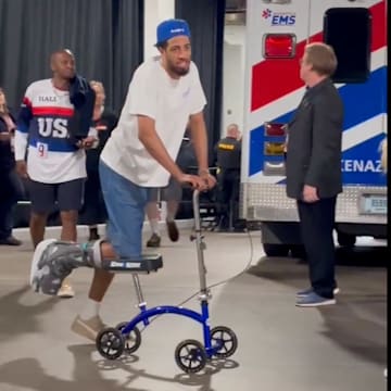 Tyrese Haliburton rides on a scooter at WNBA All-Star Weekend.