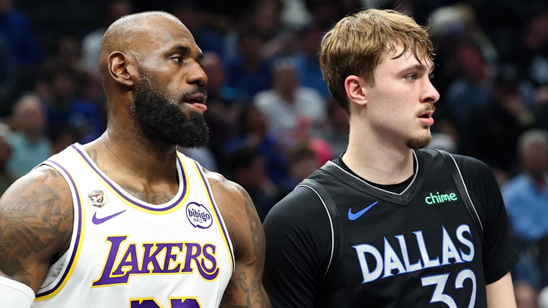 Apr 5, 2026; Dallas, Texas, USA;  Los Angeles Lakers forward LeBron James (23) and Dallas Mavericks forward Cooper Flagg (32) during the first half at American Airlines Center. Mandatory Credit: Kevin Jairaj-Imagn Images