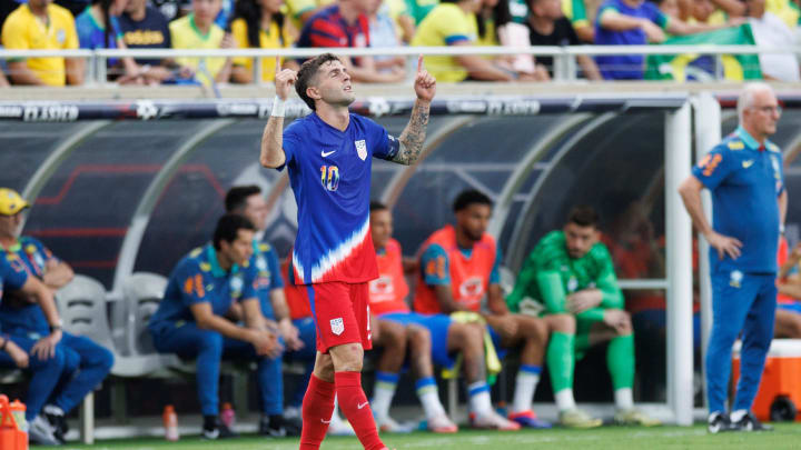 United States winger Christian Pulisic celebrates after scoring a goal against Brazil in the first half during the Continental Clasico at Camping World Stadium. United States winger Christian Pulisic celebrates after scoring a goal against Brazil in the first half during the Continental Clasico at Camping World Stadium.
