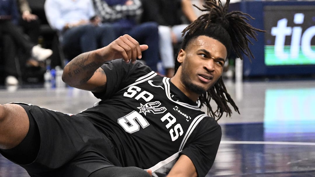 Feb 5, 2026; Dallas, Texas, USA; San Antonio Spurs guard Stephon Castle (5) looks up from the floor during the second half against the Dallas Mavericks at the American Airlines Center. Mandatory Credit: Jerome Miron-Imagn Images