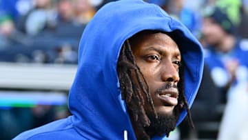 Riq Woolen of the Seattle Seahawks rests