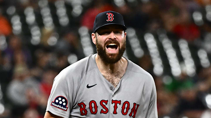 Aug 26, 2025; Baltimore, Maryland, USA; Boston Red Sox pitcher Lucas Giolito (54) reacts to a strikeout to end the eighth inning against the Baltimore Orioles at Oriole Park at Camden Yards. Mandatory Credit: James A. Pittman-Imagn Images