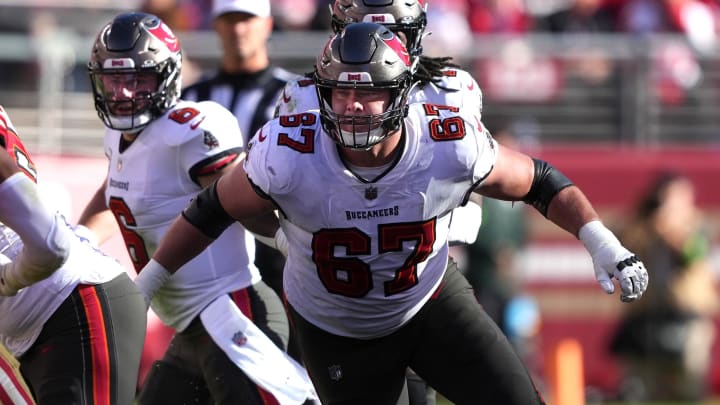 Nov 19, 2023; Santa Clara, California, USA; Tampa Bay Buccaneers offensive tackle Luke Goedeke (67) blocks against San Francisco 49ers linebacker Fred Warner (54) during the second quarter at Levi's Stadium. Mandatory Credit: Darren Yamashita-USA TODAY Sports