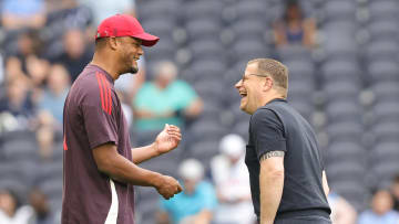 Vincent Kompany (l.) und Max Eberl