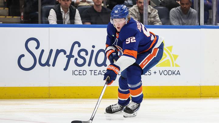 Apr 9, 2026; Elmont, New York, USA;  New York Islanders right wing Simon Holmstrom (92) plays the puck in the second period against the Toronto Maple Leafs at UBS Arena. Mandatory Credit: Wendell Cruz-Imagn Images