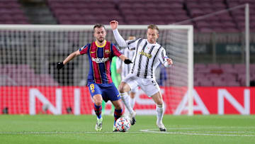 Miralem Pjanic of Fc Barcelona (L) and Arthur Henrique Ramos...