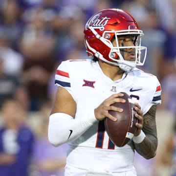 Sep 13, 2024; Manhattan, Kansas, USA; Arizona Wildcats quarterback Noah Fifita (11) drops back to pass against the Kansas State Wildcats during the third quarter at Bill Snyder Family Football Stadium. 