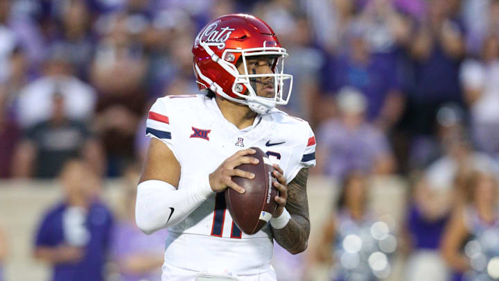 Sep 13, 2024; Manhattan, Kansas, USA; Arizona Wildcats quarterback Noah Fifita (11) drops back to pass against the Kansas State Wildcats during the third quarter at Bill Snyder Family Football Stadium. 