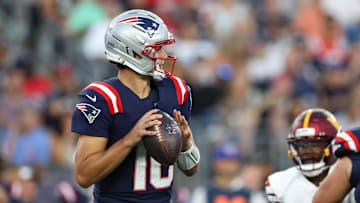 Aug 8, 2025; Foxborough, Massachusetts, USA; New England Patriots quarterback Drake Maye (10) looks to pass during the first half against the Washington Commanders at Gillette Stadium. Mandatory Credit: Paul Rutherford-Imagn Images