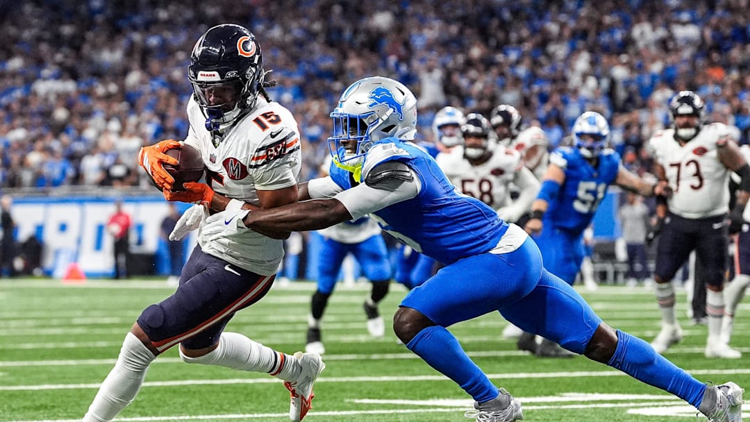 Detroit Lions cornerback Terrion Arnold (6) tackles Chicago Bears wide receiver Rome Odunze (15) during the second half at Ford Field in Detroit on Sunday, Sept. 14, 2025.