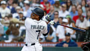 Jun 17, 2025; Seattle, Washington, USA; Seattle Mariners designated hitter Jorge Polanco (7) hits an RBI-sacrifice fly against the Boston Red Sox during the fourth inning at T-Mobile Park. Mandatory Credit: Joe Nicholson-Imagn Images