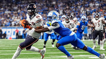 Detroit Lions cornerback Terrion Arnold (6) tackles Chicago Bears wide receiver Rome Odunze (15) during the second half at Ford Field in Detroit on Sunday, Sept. 14, 2025.