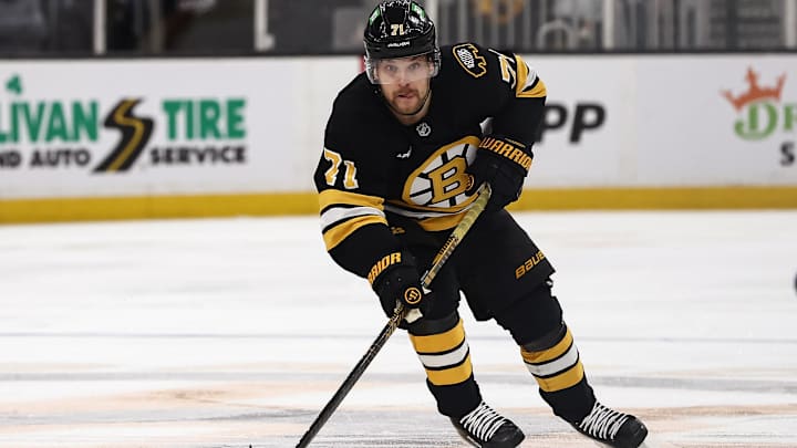 Mar 24, 2026; Boston, Massachusetts, USA; Boston Bruins left wing Viktor Arvidsson (71) skates with the puck against the Toronto Maple Leafs during the second period at TD Garden. Mandatory Credit: Winslow Townson-Imagn Images