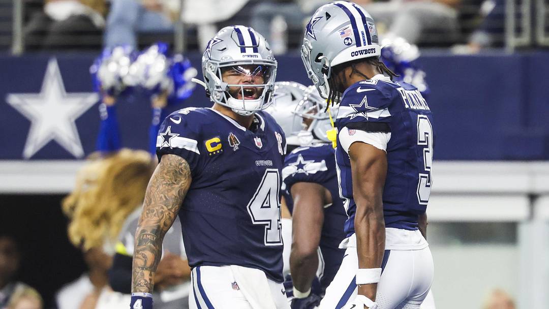 Dallas Cowboys quarterback Dak Prescott celebrates with wide receiver George Pickens following a touchdown pass caught by Pickens during the second quarter at AT&T Stadium. Dallas Cowboys quarterback Dak Prescott celebrates with wide receiver George Pickens following a touchdown pass caught by Pickens during the second quarter at AT&T Stadium.