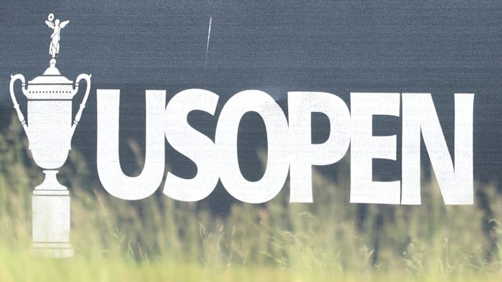 Signage on the grandstands during a practice round for the U.S. Open golf tournament at Oakmont Country Club.