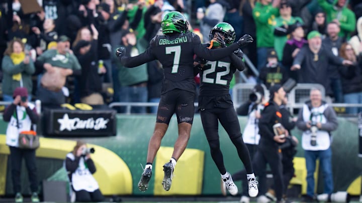 Oregon defensive backs Ify Obidegwu, left, and Jadon Canady celebrate against USC.