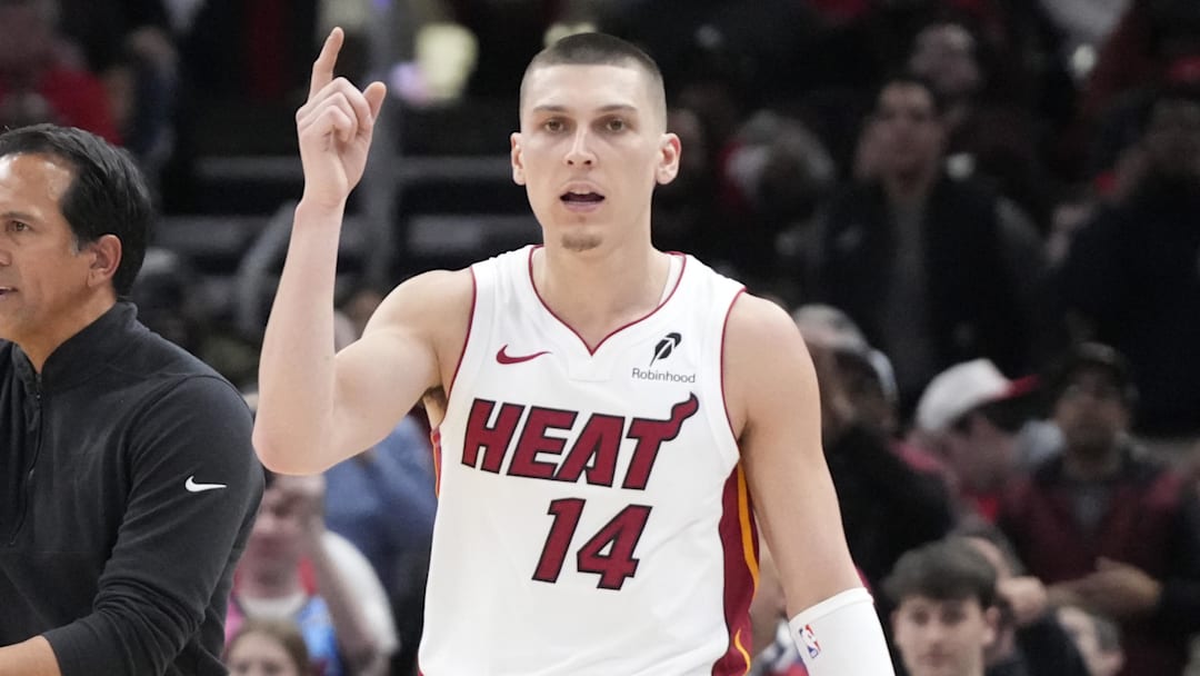 Miami Heat guard Tyler Herro (14) and head coach Erik Spoelstra ask (Mandatory Credit: David Banks-Imagn Images)