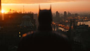 ROBERT PATTINSON as Batman in Warner Bros. Pictures’ action adventure “THE BATMAN,” a Warner Bros. Pictures release. Courtesy of Warner Bros. Pictures/ ™ & © DC Comics. Pictures release. © 2021 Warner Bros. Entertainment Inc. All Rights Reserved.