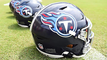 Jul 29, 2023; Nashville, TN, USA; View of helmets on the field as Tennessee Titans players finish training camp practice. Mandatory Credit: Christopher Hanewinckel-Imagn Images