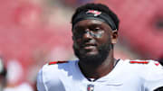 Sep 22, 2024; Tampa, Florida, USA;  Tampa Bay Buccaneers wide receiver Chris Godwin (14) works out prior to the game against the Denver Broncos at Raymond James Stadium. Mandatory Credit: Kim Klement Neitzel-Imagn Images