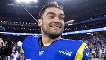 Jan 13, 2025; Glendale, AZ, USA; Los Angeles Rams wide receiver Puka Nacua (17) celebrates after defeating the Minnesota Vikings during an NFC wild card game at State Farm Stadium. Mandatory Credit: Mark J. Rebilas-Imagn Images
