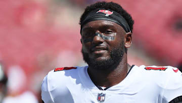 Sep 22, 2024; Tampa, Florida, USA;  Tampa Bay Buccaneers wide receiver Chris Godwin (14) works out prior to the game against the Denver Broncos at Raymond James Stadium. Mandatory Credit: Kim Klement Neitzel-Imagn Images