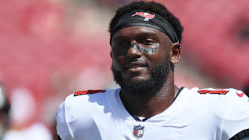 Sep 22, 2024; Tampa, Florida, USA;  Tampa Bay Buccaneers wide receiver Chris Godwin (14) works out prior to the game against the Denver Broncos at Raymond James Stadium. Mandatory Credit: Kim Klement Neitzel-Imagn Images