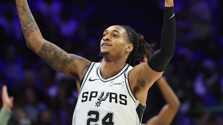 Mar 3, 2026; Philadelphia, Pennsylvania, USA; San Antonio Spurs guard Devin Vassell (24) reacts to his three pointer against the Philadelphia 76ers during the third quarter at Xfinity Mobile Arena. Mandatory Credit: Bill Streicher-Imagn Images