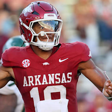 Arkansas Razorbacks quarterback Taylen Green (10) passes in the second half against the UAB Blazers at Razorback Stadium.