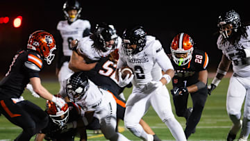 Harrisburg running back Messiah Mickens (2) runs with the ball during the PIAA District 3 Class 6A Championship against Central York at Cedar Cliff High School on Friday, Nov. 21, 2025, in New Cumberland.