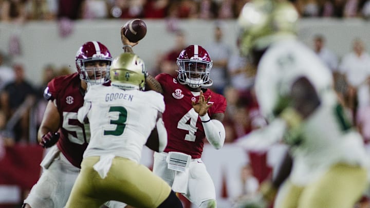 Sep 7, 2024; Tuscaloosa, Alabama, USA; Alabama Crimson Tide quarterback Jalen Milroe (4) eyes a pass against the South Florida Bulls during the third quarter at Bryant-Denny Stadium. Mandatory Credit: William McLelland-Imagn Images