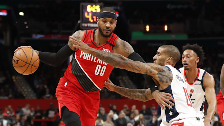 Carmelo Anthony dribbles against the Wizards in 2020. Carmelo Anthony dribbles against the Wizards in 2020.