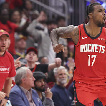 Apr 23, 2025; Houston, Texas, USA; Houston Rockets forward Tari Eason (17) reacts after making a basket during the second quarter during game two of the first round for the 2024 NBA Playoffs against the Golden State Warriors at Toyota Center. Mandatory Credit: Troy Taormina-Imagn Images